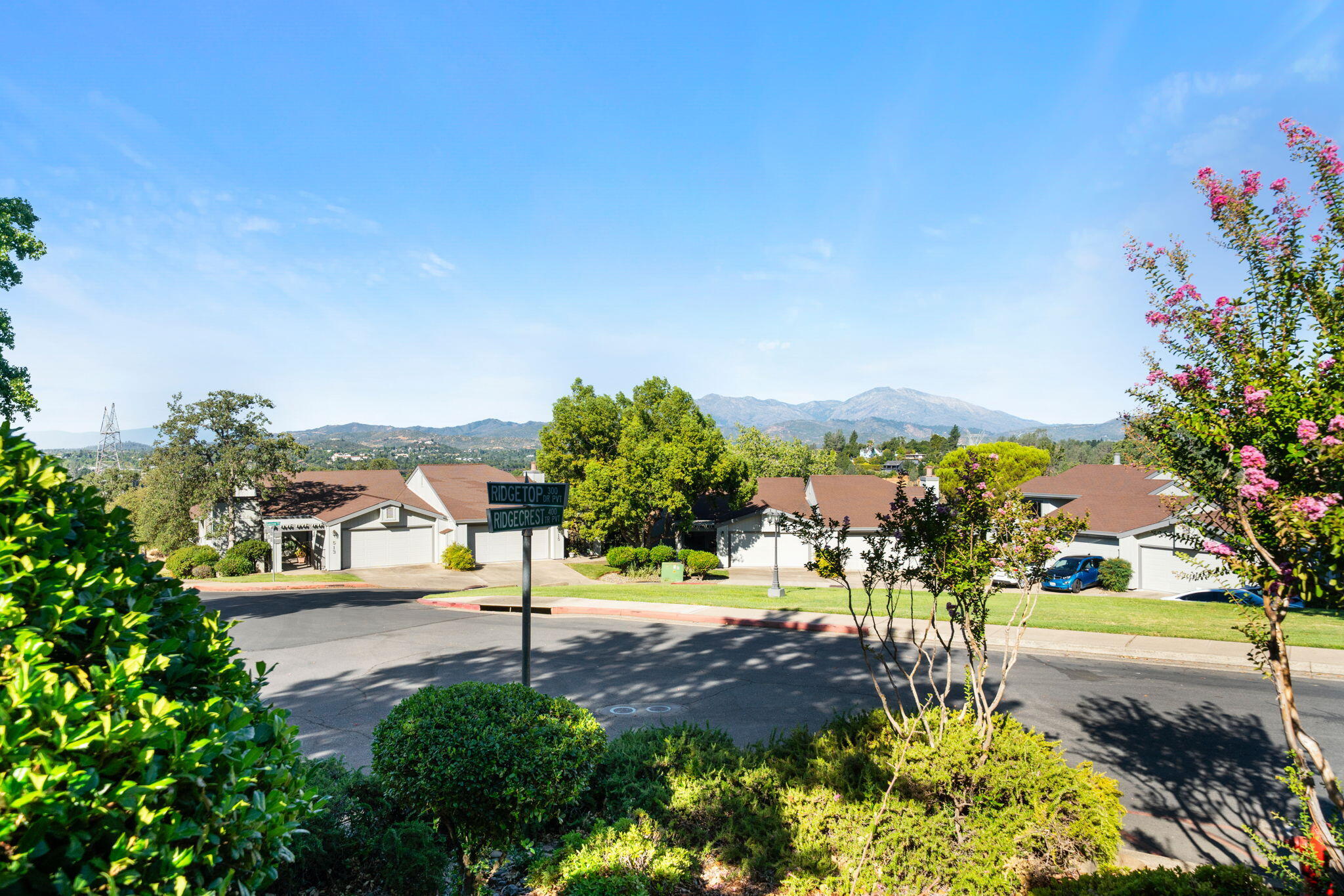 426 Ridgecrest Trail, Unit 223 Redding, CA 96003 - Photo 53 of 59 a view of a street with a building in the background