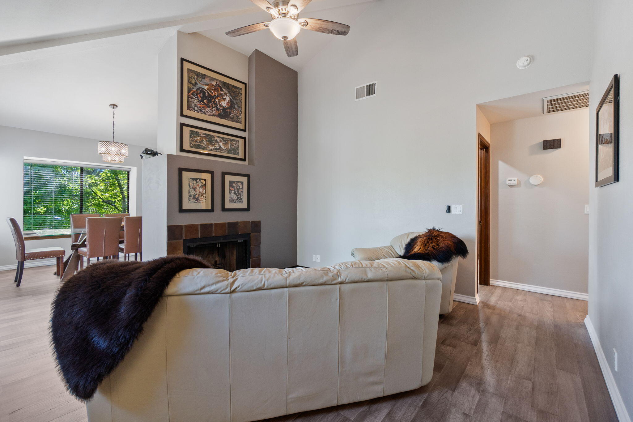 426 Ridgecrest Trail, Unit 223 Redding, CA 96003 - Photo 8 of 59 a living room with furniture and a chandelier