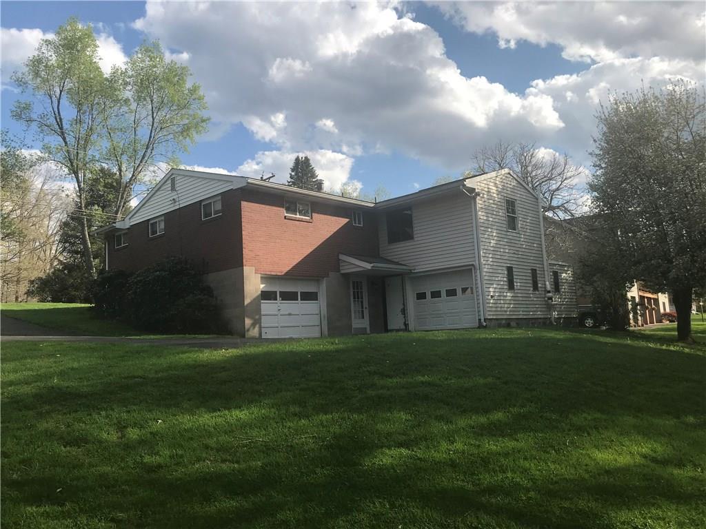 156 Stormer Road Indiana, PA 15701 - Photo 2 of 14 Rear View of Addition & 2 integral garages spacious yards