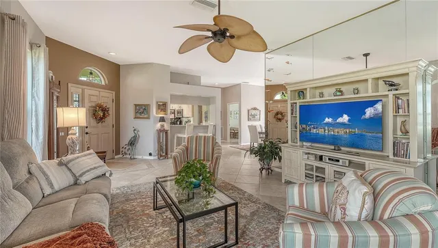 a view of swimming pool with a patio and a yard