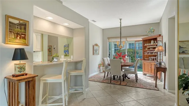 a bathroom with double vanity sinks double vanity tub shower and a mirror