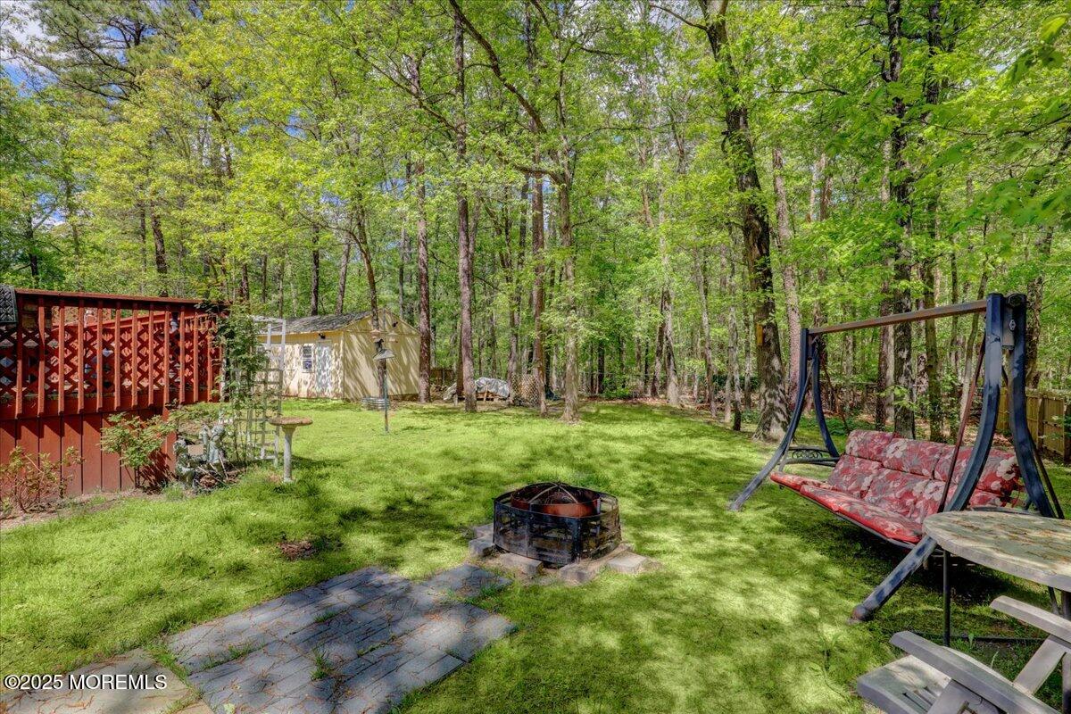 165 Cassville Road Jackson, NJ 08527 - Photo 24 of 24 a view of a chair and table in the garden