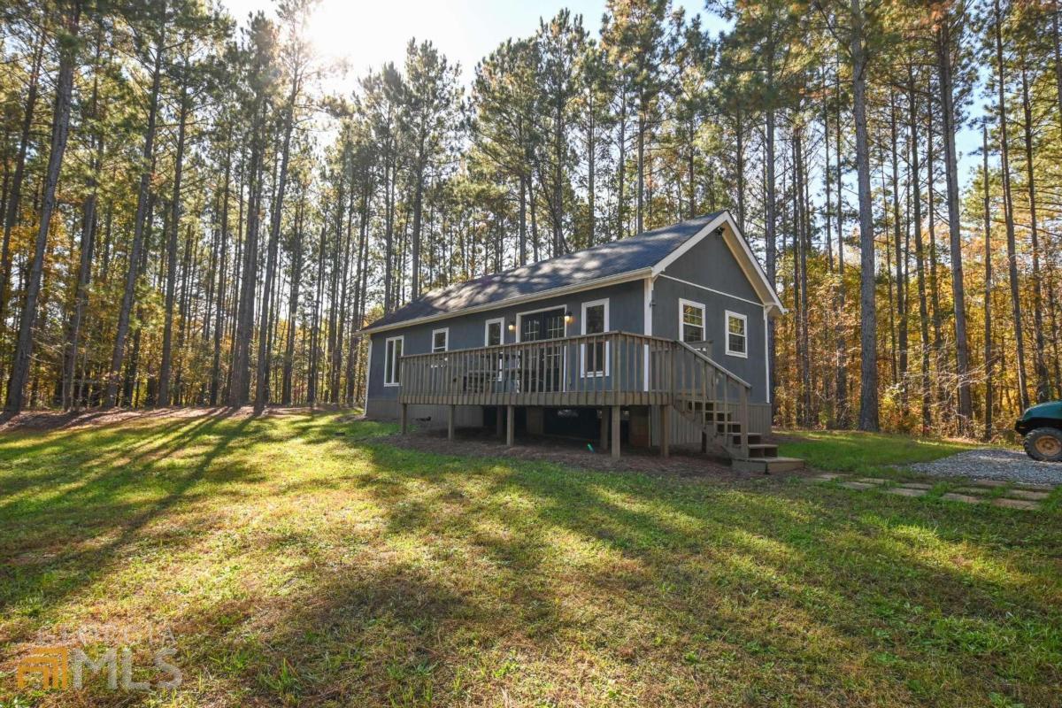 943 Wesley Chapel Road Lexington, GA 30648 - Photo 1 of 1 a view of a house with a yard and sitting area