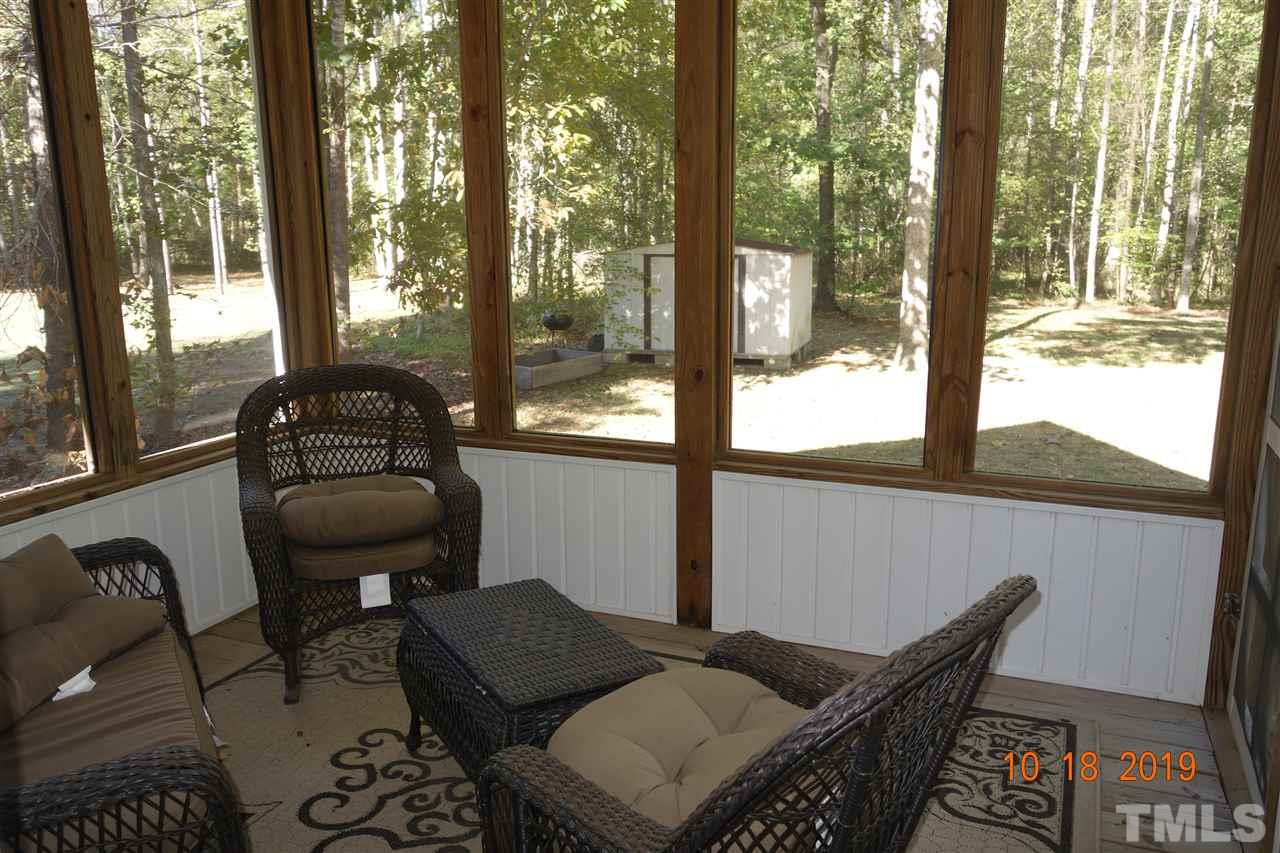 228 Beavertail Road Henderson, NC 27537 - Photo 22 of 29 Picture of the screened porch