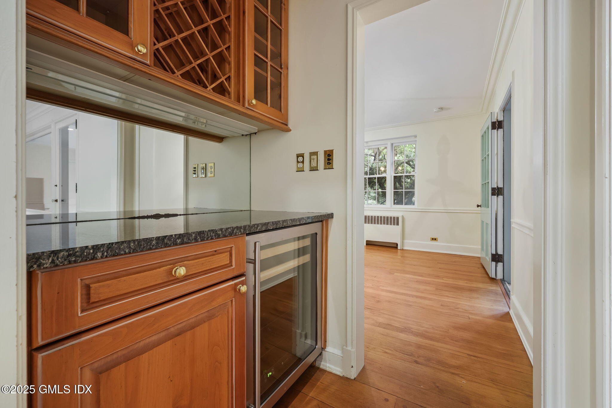 320 Cognewaugh Road Cos Cob, CT 06807 - Photo 13 of 27 a kitchen view with granite countertop a oven a cabinets and wooden floor