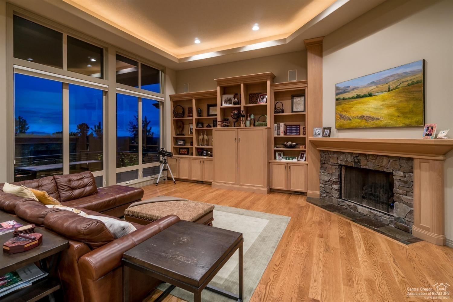 3155 Northwest Metke Place Bend, OR 97703 - Photo 8 of 22 Living room with fireplace and built in