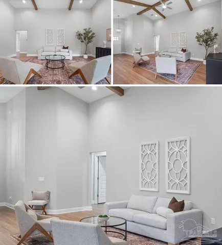 a kitchen with counter top space and painting on the wall