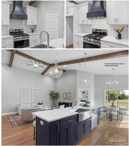 a kitchen with a stove a sink and a refrigerator