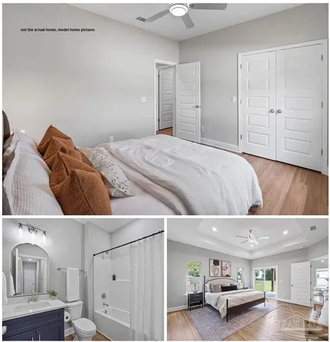 a bedroom with a bed and a view of kitchen