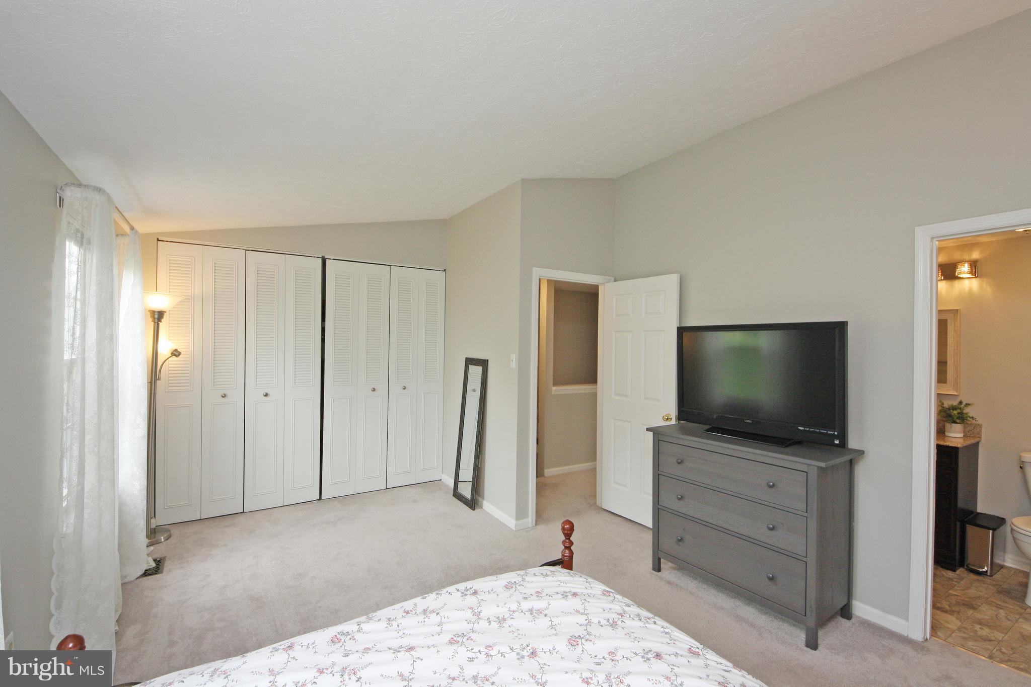 2152 Cedar Barn Way Baltimore, MD 21244 - Photo 15 of 29 a room with furniture and flat screen tv