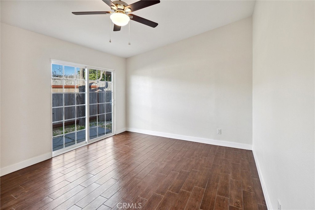5153 Loma Verde Oceanside, CA 92056 - Photo 8 of 18 wooden floor in an empty room with a window