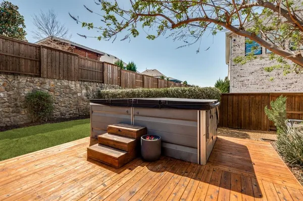 a wooden bench sitting on top of a wooden floor