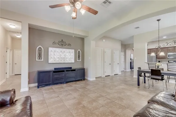 a living room with furniture and a window