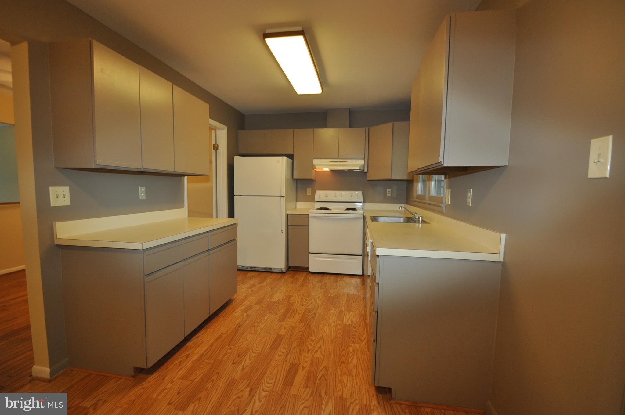 9125 Saffron Lane Silver Spring, MD 20901 - Photo 8 of 18 a room with storage and utility