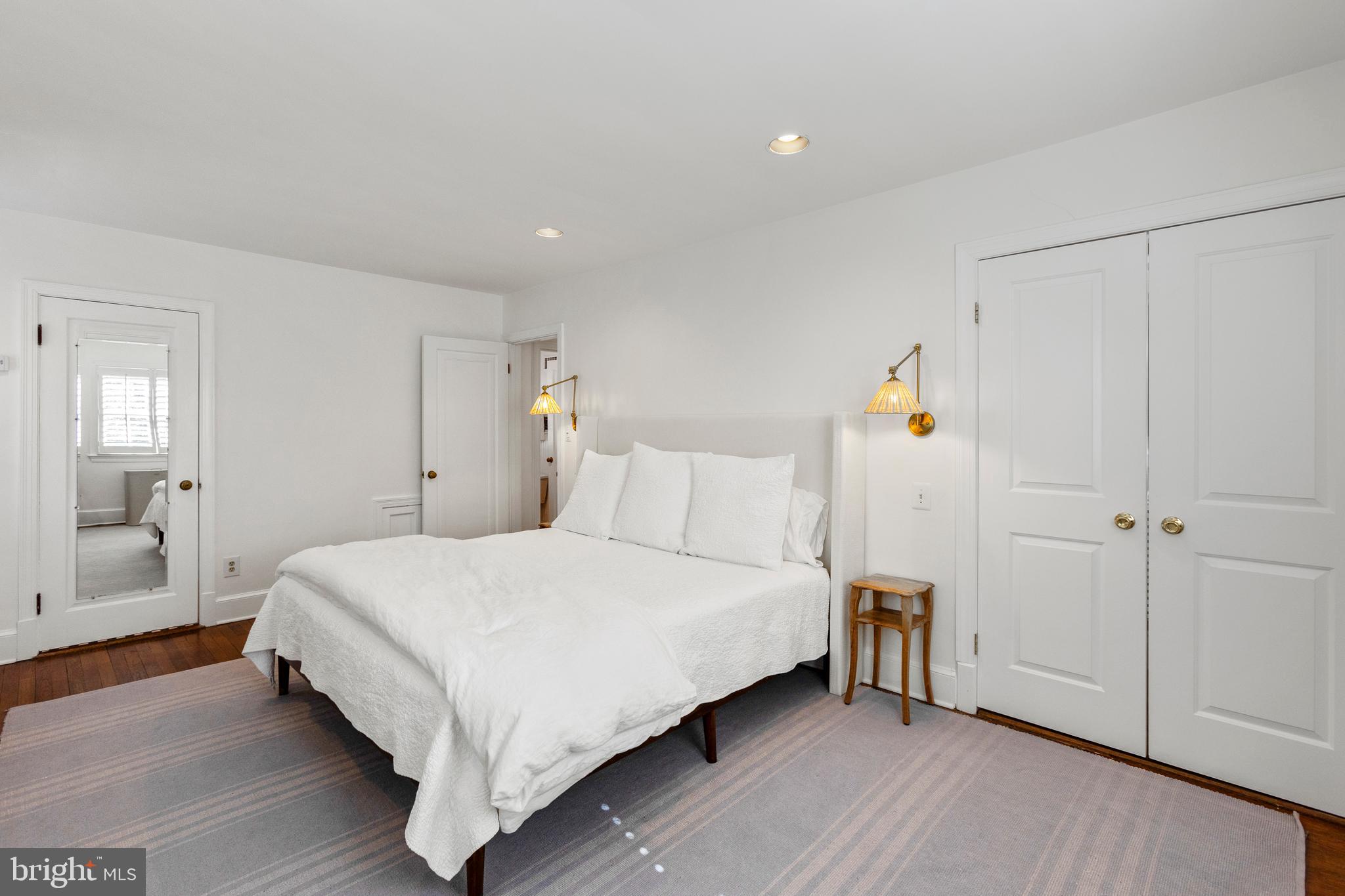 3303 Rolling Road Chevy Chase, MD 20815 - Photo 20 of 51 a large bedroom with a bed and a closet