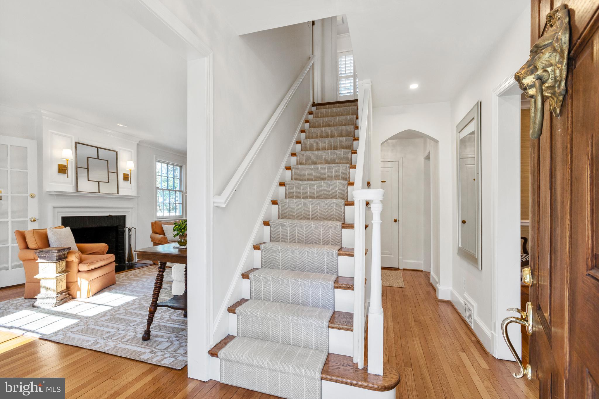 3303 Rolling Road Chevy Chase, MD 20815 - Photo 2 of 51 a view of entryway and hall with wooden floor