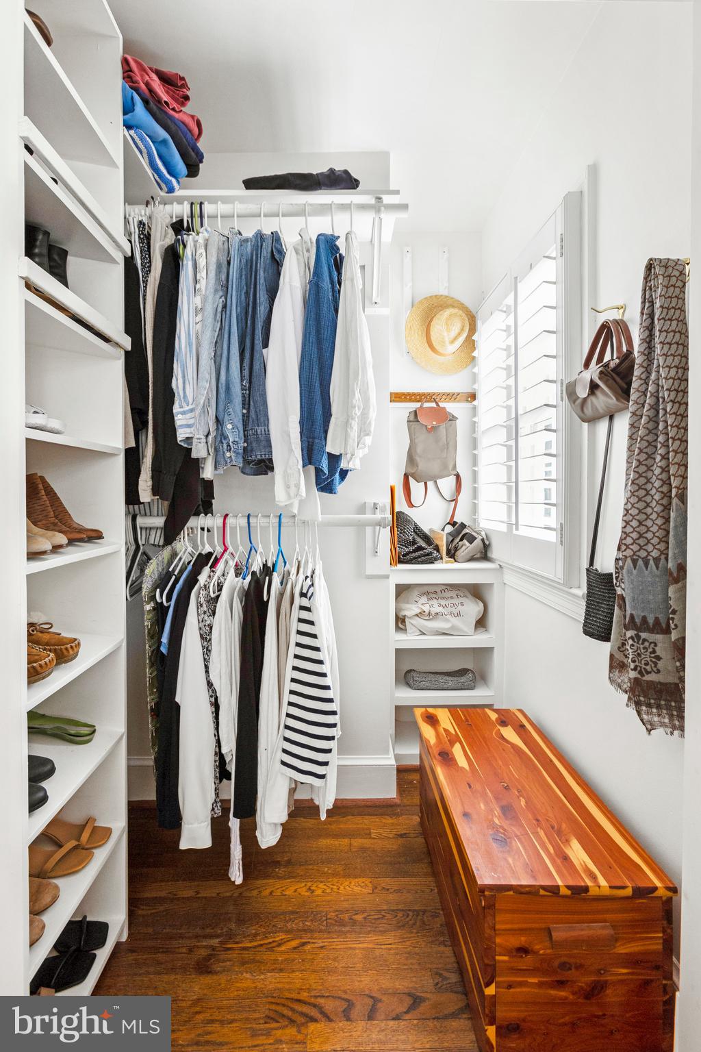 3303 Rolling Road Chevy Chase, MD 20815 - Photo 22 of 51 a view of walk in closet with clothes and shoes