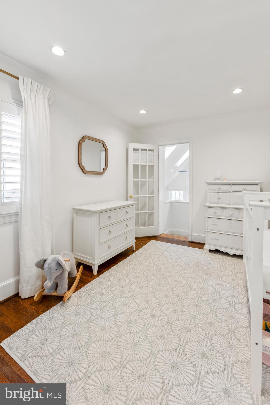 3303 Rolling Road Chevy Chase, MD 20815 - Photo 24 of 51 a view of a room with furniture and window