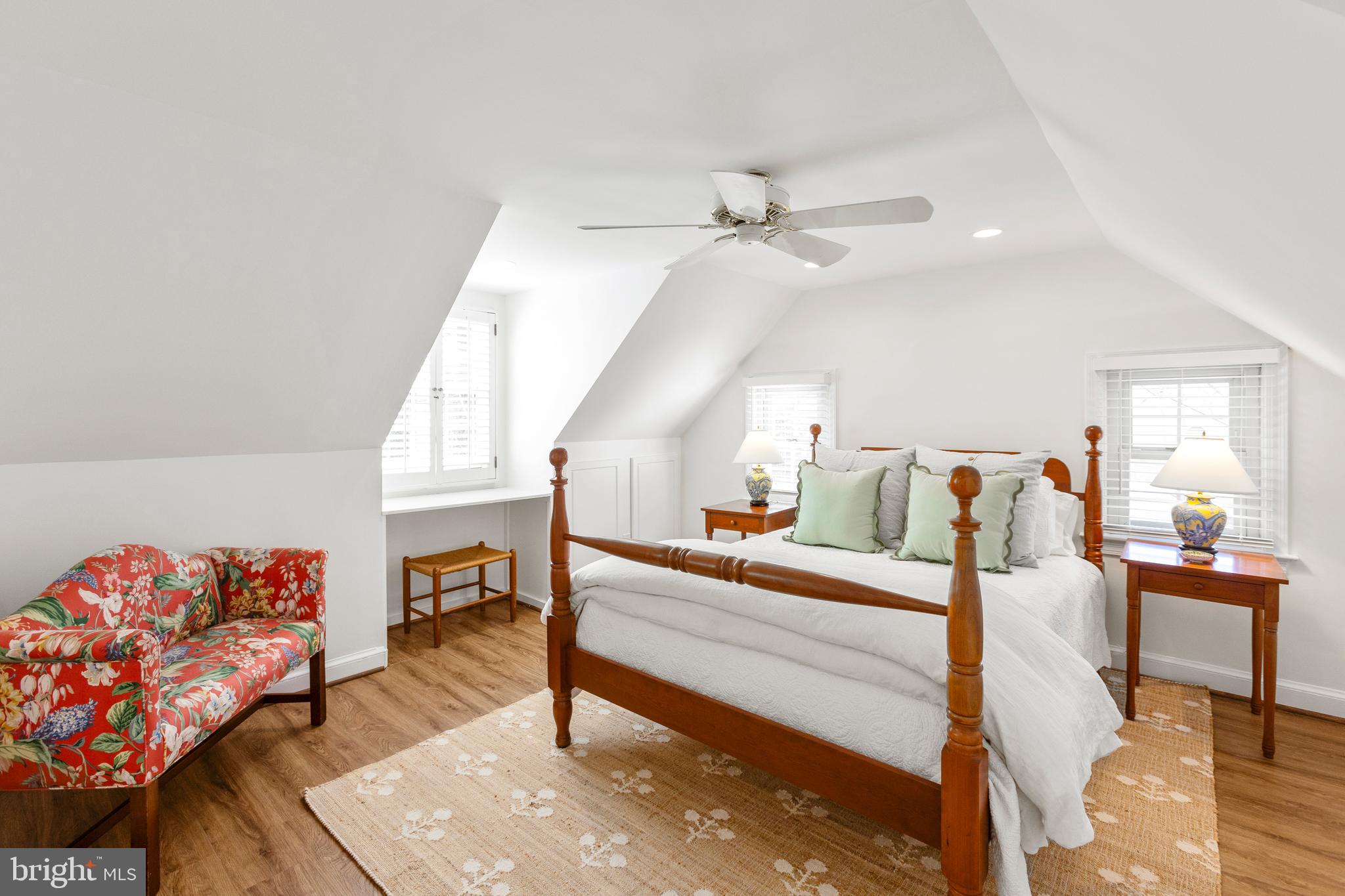 3303 Rolling Road Chevy Chase, MD 20815 - Photo 27 of 51 a bedroom with furniture and a wooden floor
