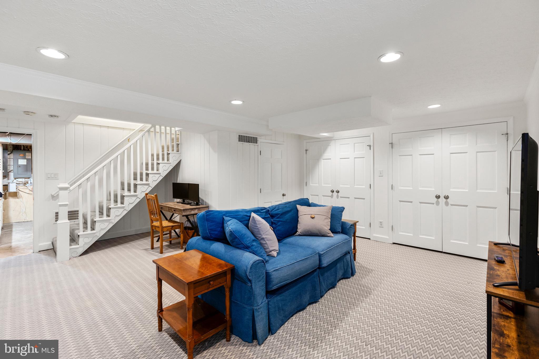 3303 Rolling Road Chevy Chase, MD 20815 - Photo 31 of 51 a living room with furniture and wooden floor
