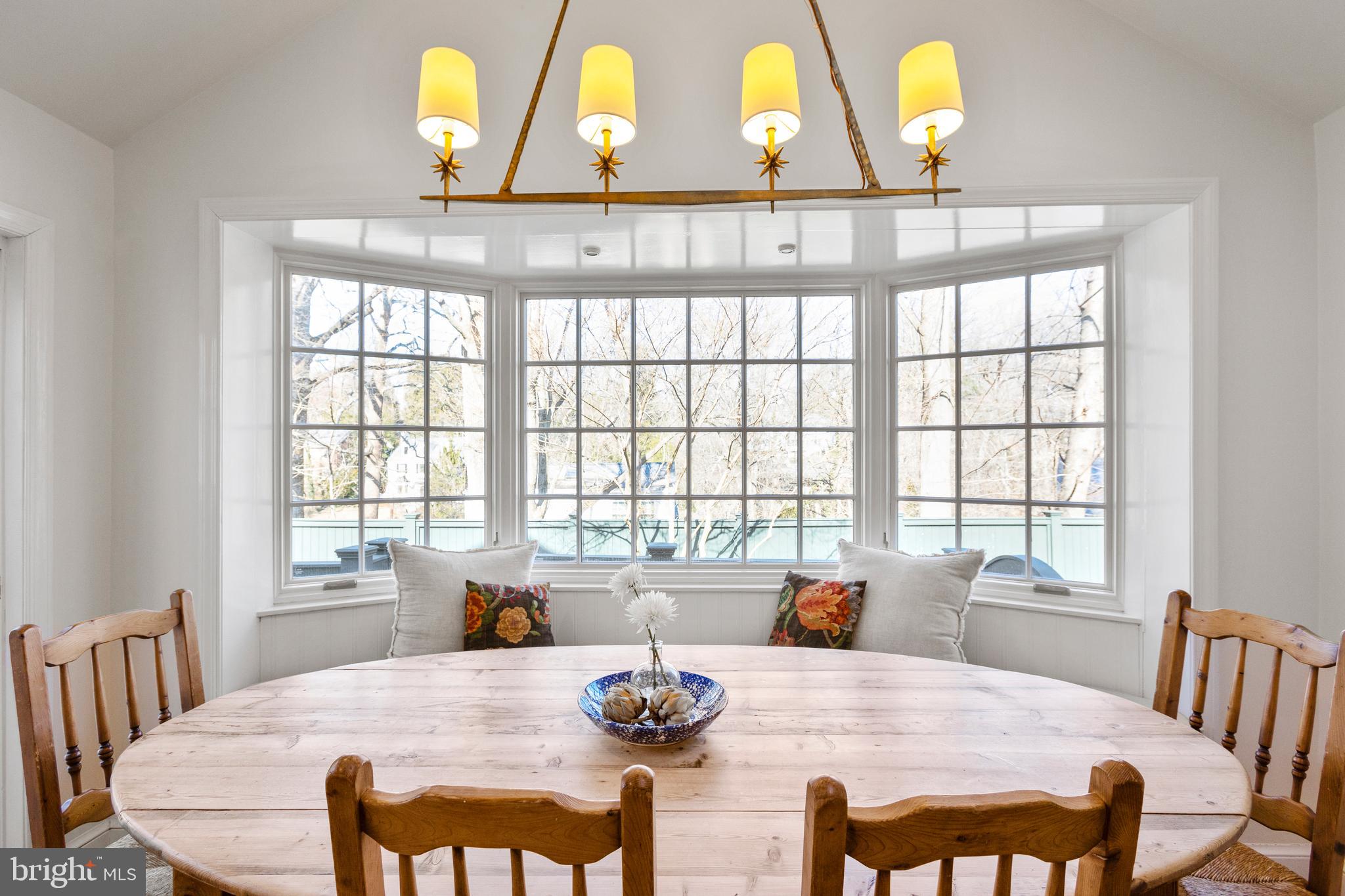 3303 Rolling Road Chevy Chase, MD 20815 - Photo 10 of 51 a view of a dining room with furniture