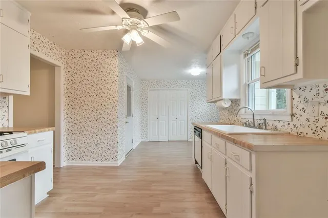 $325,000 | 246 Greenwood Drive Northwest, Lilburn, GA 30047