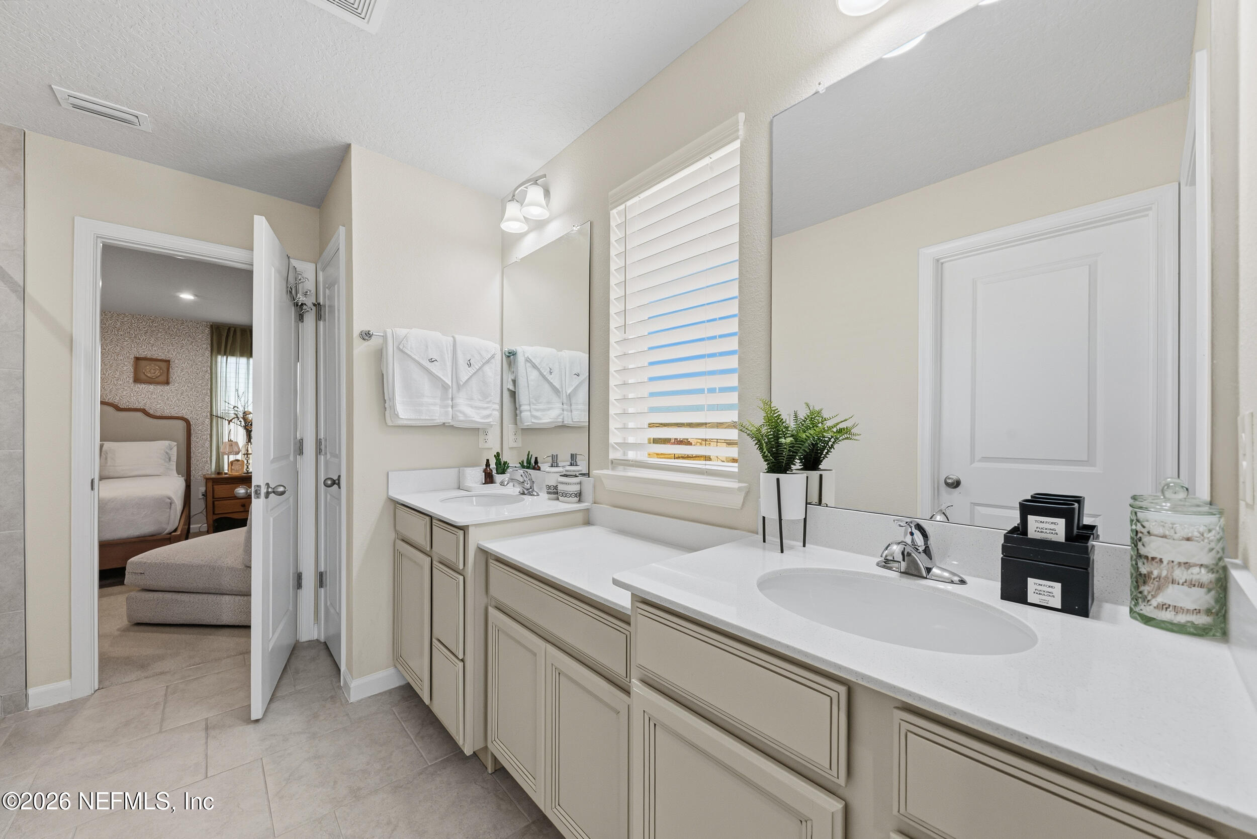 1052 Victoria Hills Jacksonville, FL 32221 - Photo 11 of 27 a bathroom with a sink and a mirror