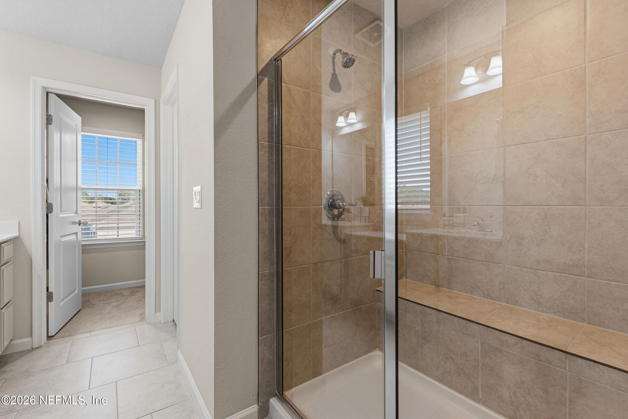 1052 Victoria Hills Jacksonville, FL 32221 - Photo 12 of 27 a bathroom with a shower and a sink