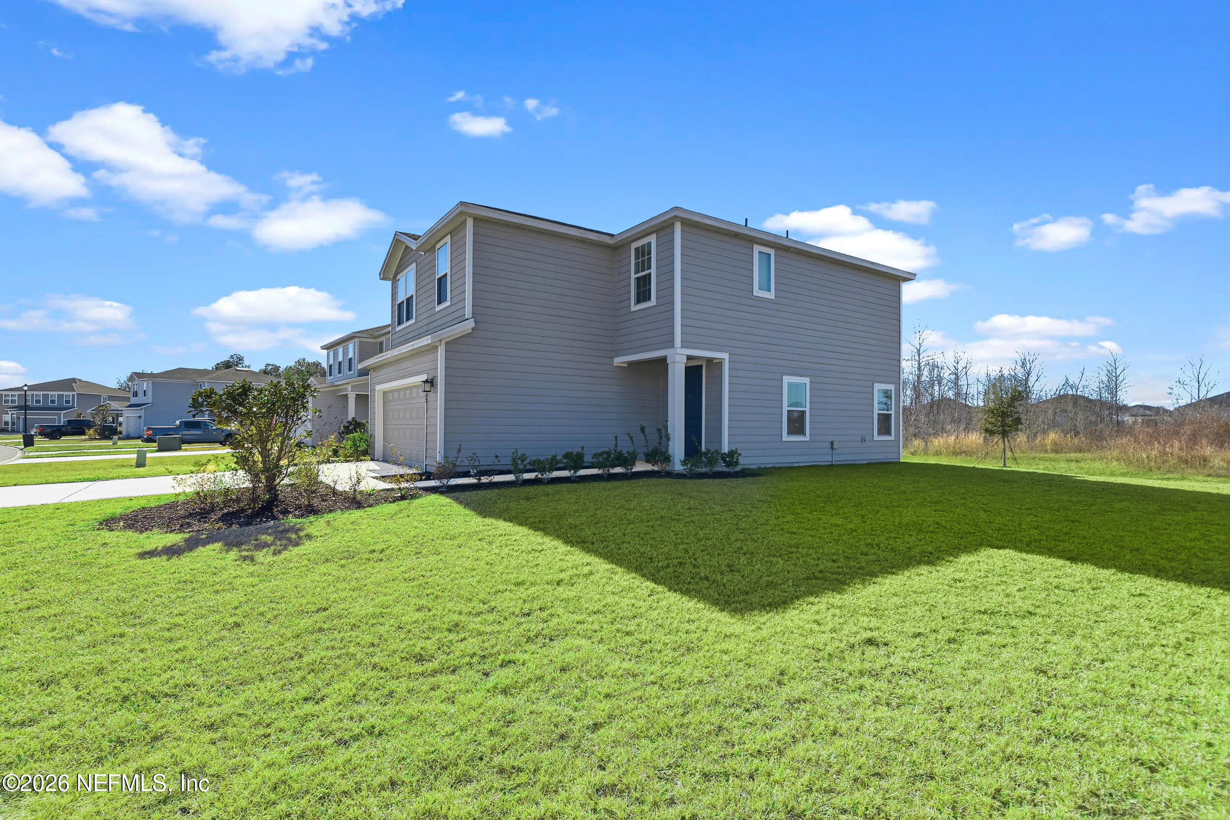 1052 Victoria Hills Jacksonville, FL 32221 - Photo 20 of 27 a backyard of a house with lots of green space
