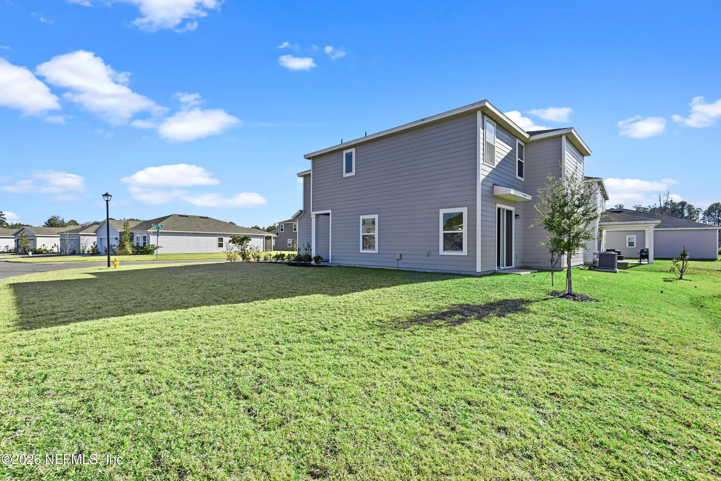 1052 Victoria Hills Jacksonville, FL 32221 - Photo 21 of 27 a house view with a garden space