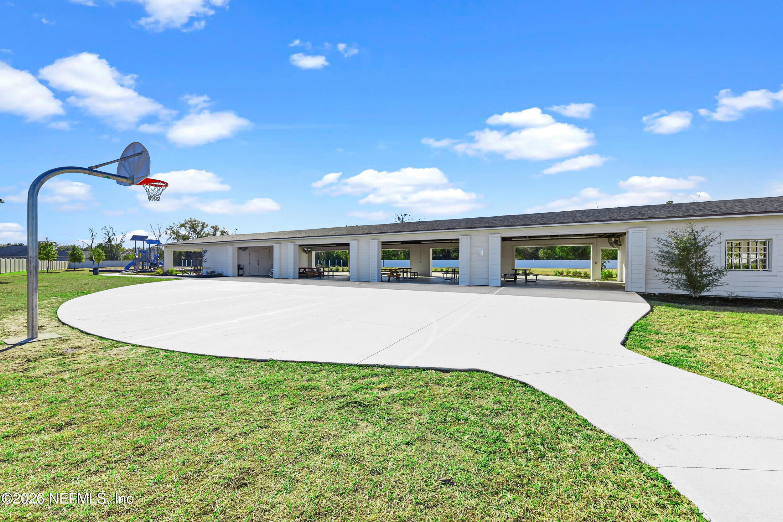 1052 Victoria Hills Jacksonville, FL 32221 - Photo 24 of 27 a front view of a house with garden