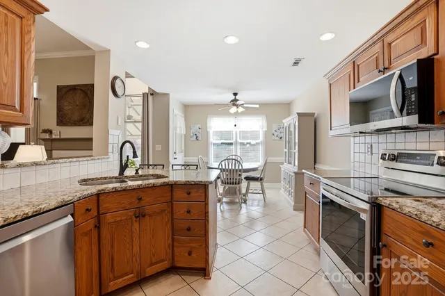 a dining room with furniture window and wooden floor