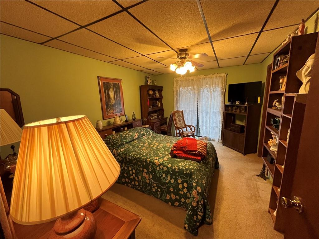 792 Main Street Anita, PA 15711 - Photo 13 of 16 a bedroom with a bed and a walk in closet