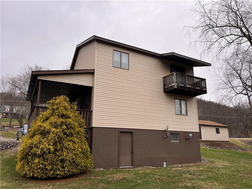 792 Main Street Anita, PA 15711 - Photo 3 of 16 a front view of a house with garden