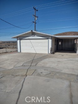 1121 Mojave Drive Barstow, CA 92311 - Photo 9 of 9 a view of garage with a window