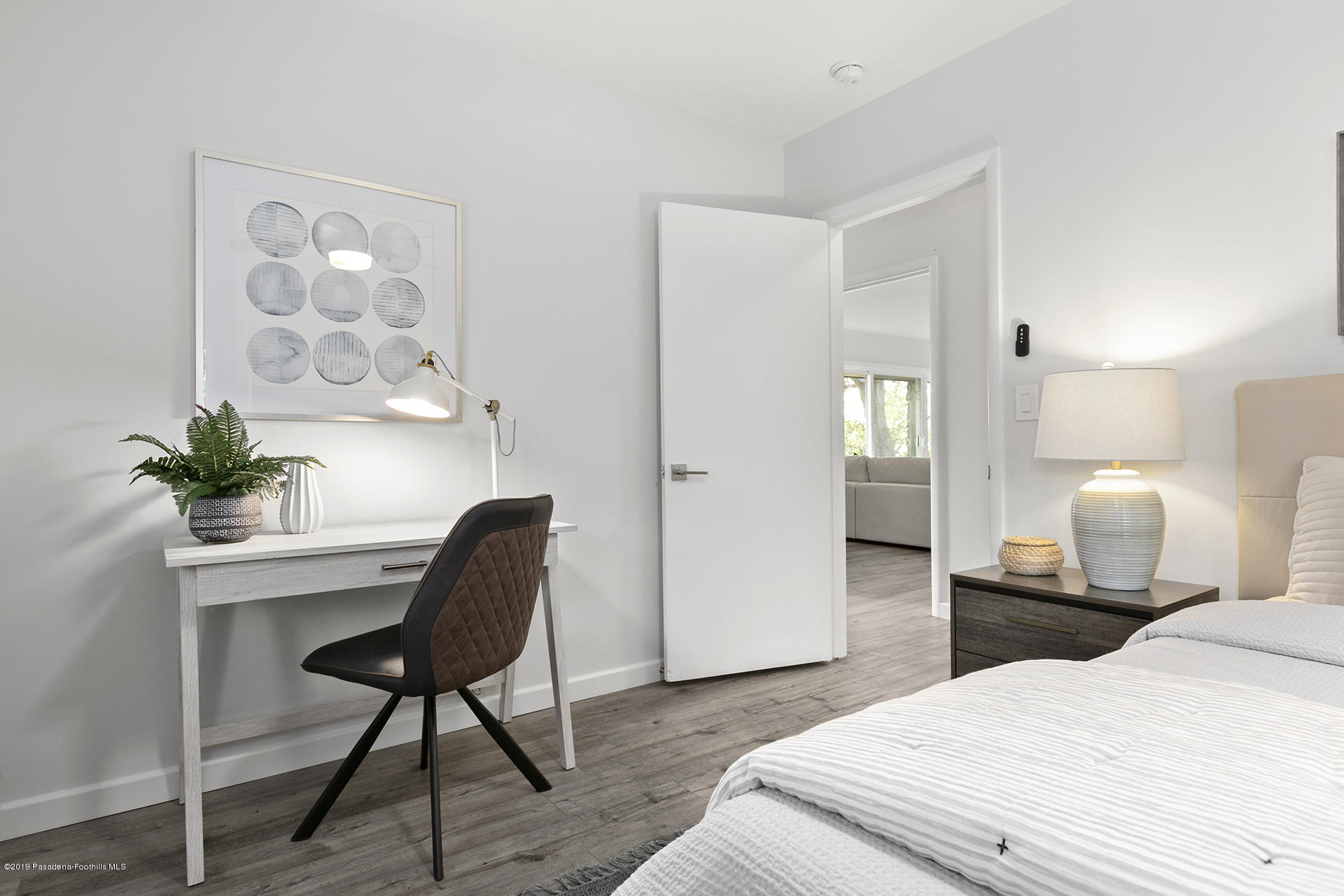 3300 Calvert Road Pasadena, CA 91107 - Photo 20 of 26 a bedroom with a bed and a potted plant