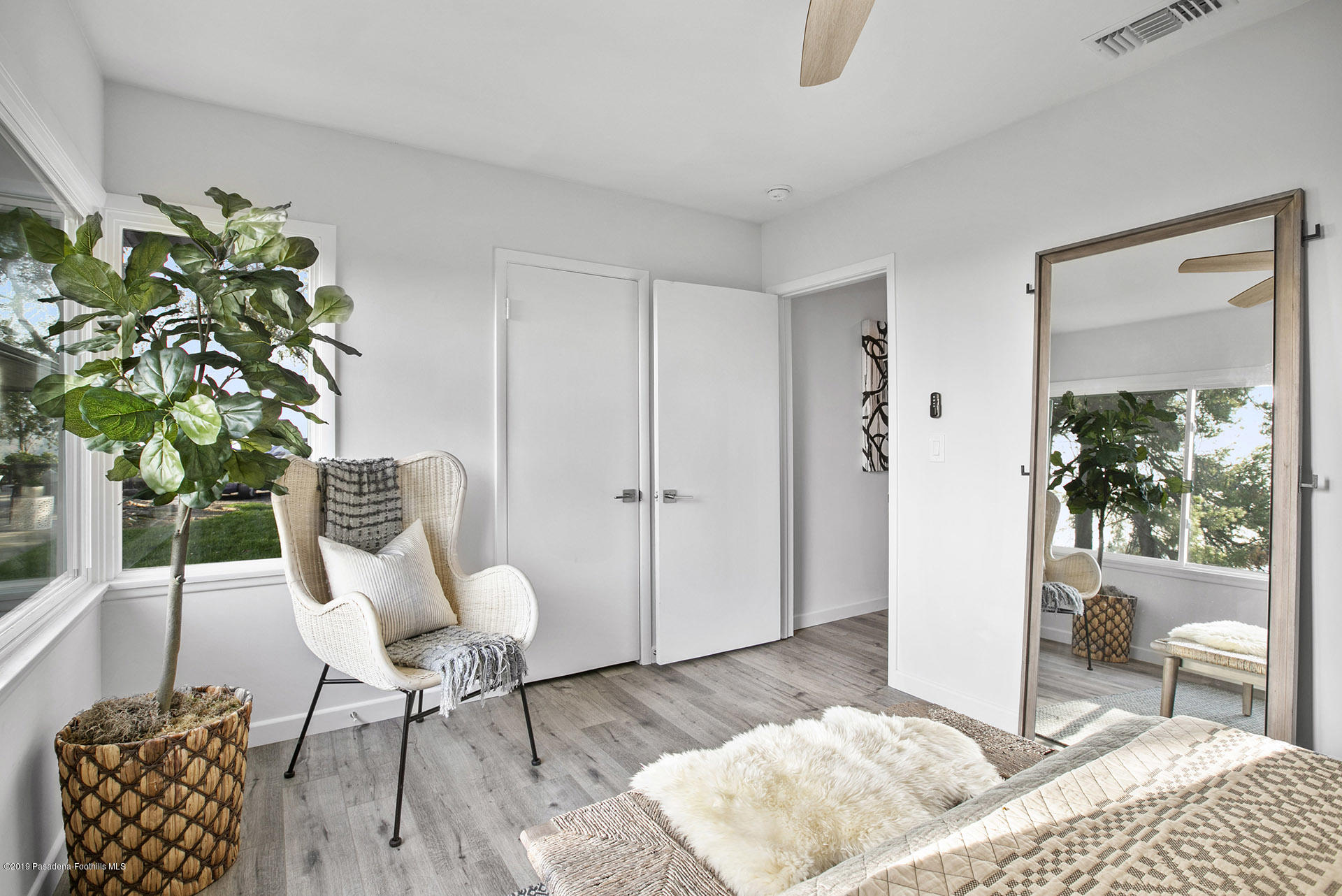 3300 Calvert Road Pasadena, CA 91107 - Photo 23 of 26 a bedroom with furniture and a potted plant