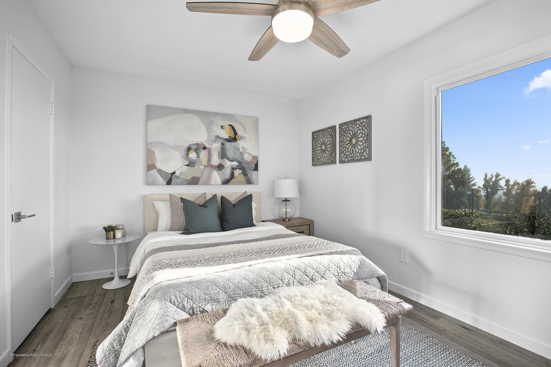 3300 Calvert Road Pasadena, CA 91107 - Photo 24 of 26 a bedroom with a bed and a window