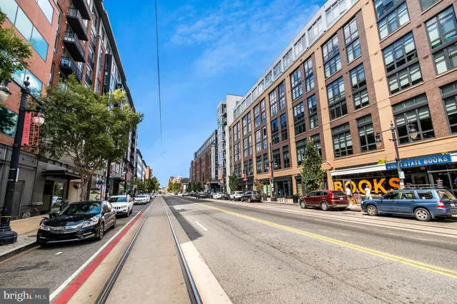 a view of street with sitting area