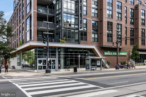 a view of a building with sitting area