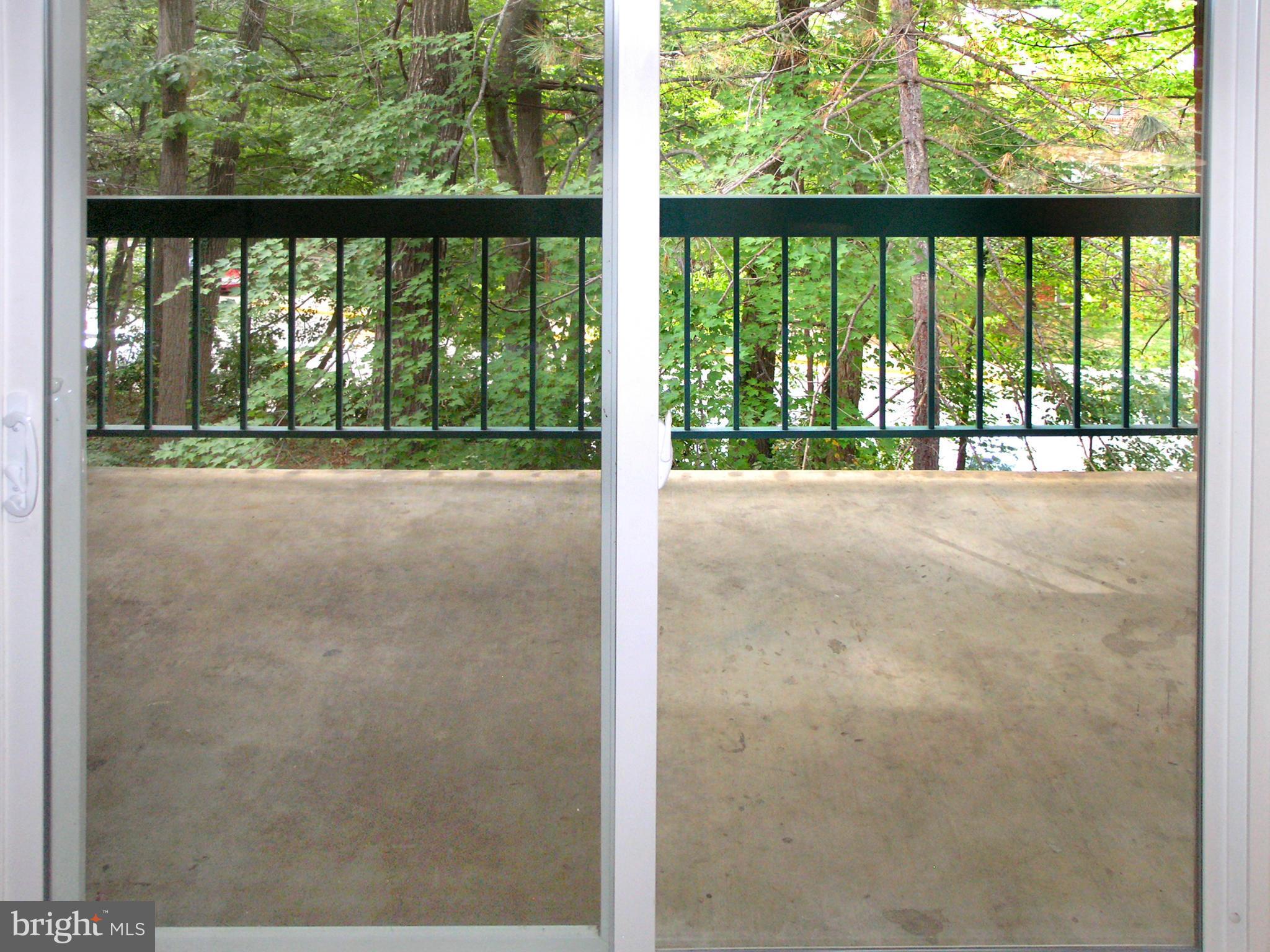 11817 Breton Court, Unit 21D Reston, VA 20191 - Photo 23 of 27 Balcony through Living Room slider