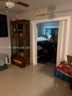 a bedroom with a bed and a walk in closet