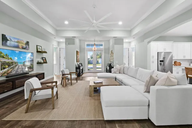 a dining room with furniture and windows