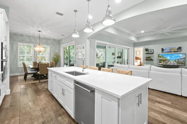 a dining room with furniture and windows