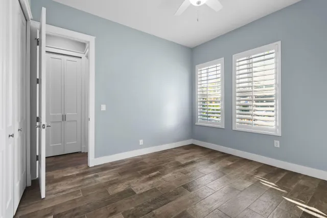 a living room with furniture and a garden