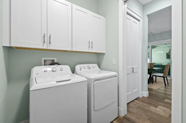 a view of a chair and table in the garden