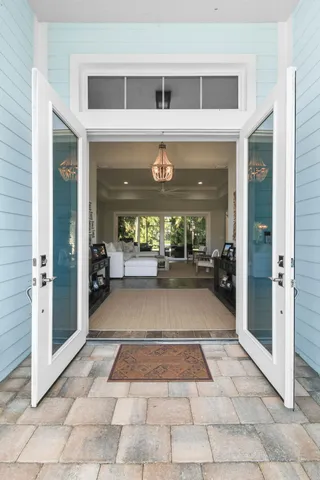 a living room with furniture and a table
