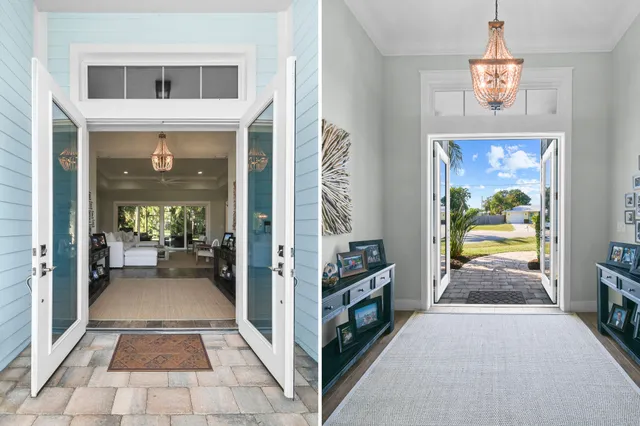 a living room with couches and kitchen view with wooden floor