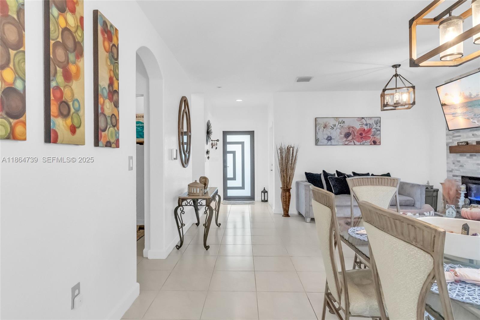 1635 Southeast 20th Terrace Homestead, FL 33035 - Photo 23 of 52 a living room with furniture and a table