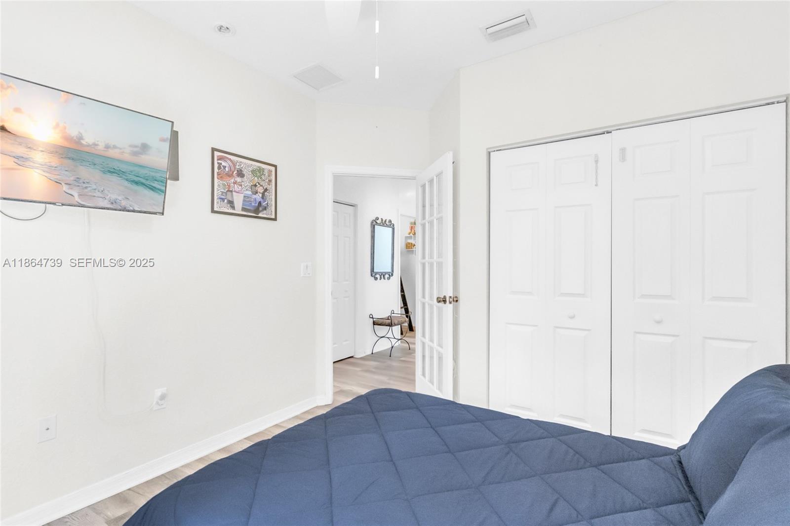 1635 Southeast 20th Terrace Homestead, FL 33035 - Photo 40 of 52 a view of a livingroom with wooden floor and cabinet